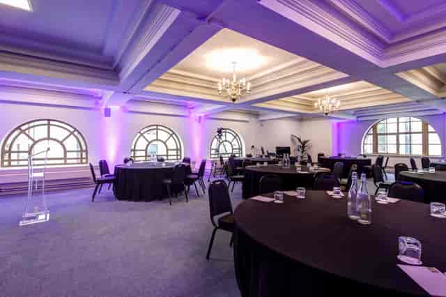 Donald English speaking at Central Hall Westminster, a stylish venue for corporate events.