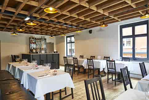 First Floor Dining Room at 63 Degrees, cozy ambiance for intimate meetings and events.