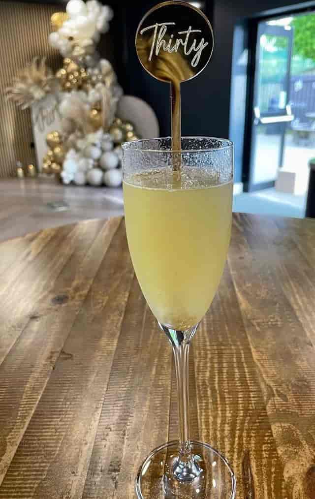 Elegant cocktail in a sports bar, perfect for networking events and celebrations.