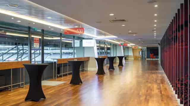 Hogan Mezzanine Suite, modern event space with polished floors, ideal for corporate receptions.