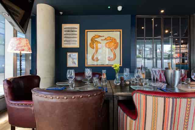 Stylish dining area in The Cabin, perfect for intimate meetings and small events.