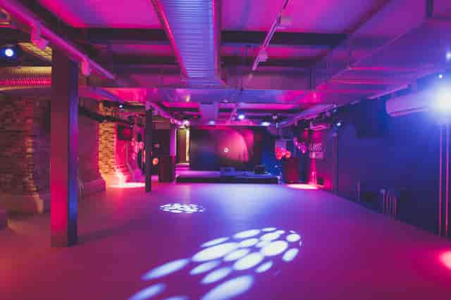 Versatile event space in Atlantis with modern lighting for corporate and social gatherings.