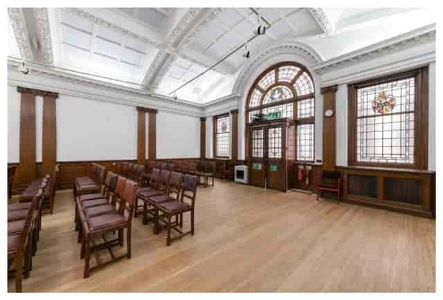 Swedenborg Hall meeting space with wooden flooring, ideal for presentations and events.