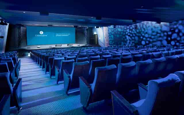 Modern auditorium with tiered seating, ideal for conferences and corporate events.