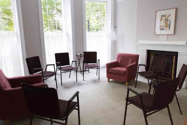 Guild Hall meeting space with circular seating for workshops and group sessions.
