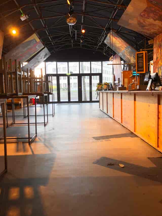 Spacious Arch 1 venue with natural light, ideal for events and gatherings.