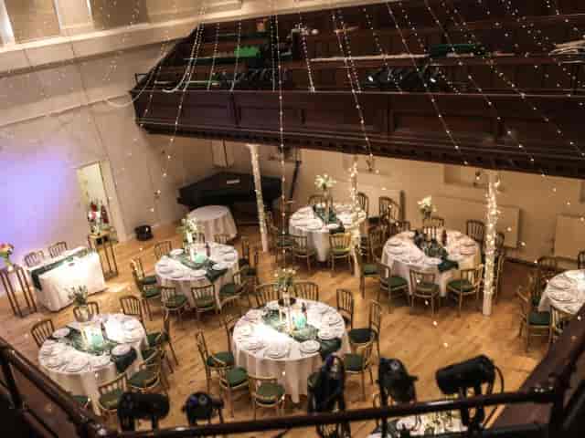 Elegant event space in The Amadeus with round tables, ideal for weddings and corporate events.