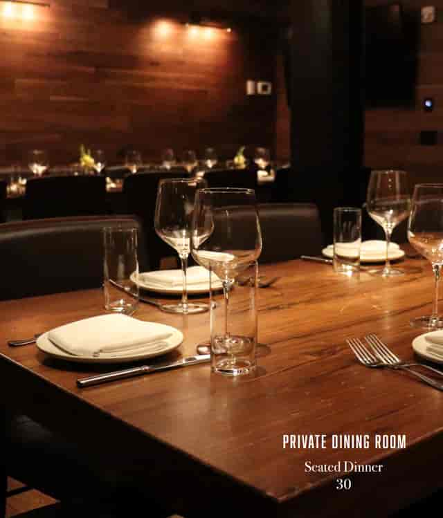Private dining room at La Scarpetta with elegant table setup for corporate events.