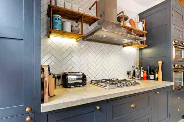 Modern kitchen in Shoreditch loft, ideal for culinary events and cooking classes.