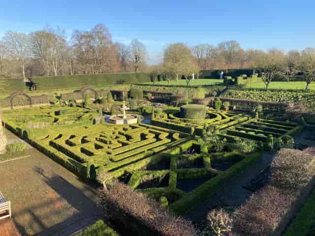 Old Palace at Hatfield House, lush garden venue for weddings and outdoor events.