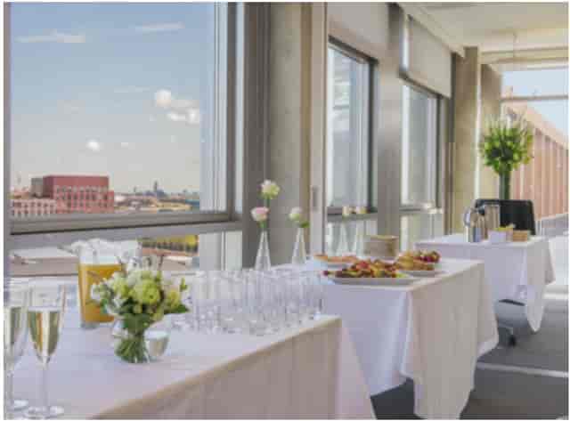 Combined meeting rooms with elegant decor for conferences and receptions at 5 Pancras Square.