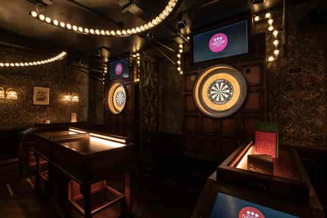 Stylish darts venue at The Upstairs Bar, perfect for corporate events and networking.