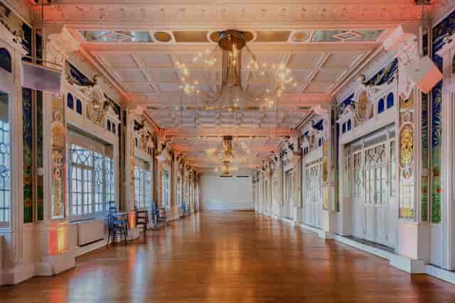 Elegant Salon des Miroirs venue with ornate ceiling, perfect for corporate events and receptions.