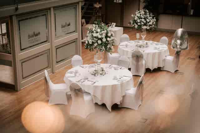 Elegant event space at Hatfield House with floral centerpieces for weddings and gatherings.