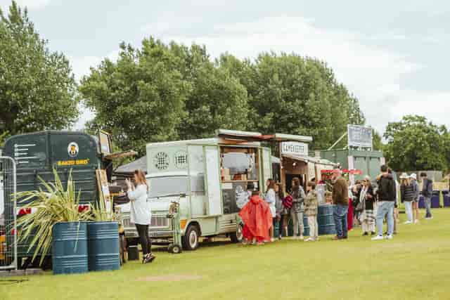 Outdoor food truck event at Hatfield House, perfect for networking and community gatherings.