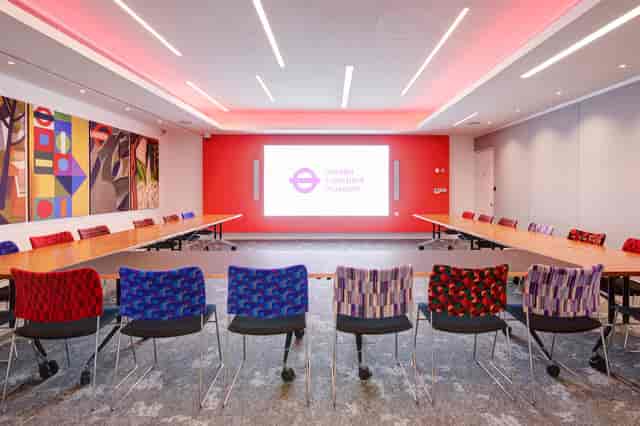 Cubic Boardroom at London Transport Museum, modern meeting room with vibrant seating.