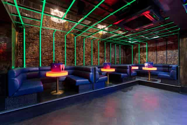 VIP Lounge in Zebrano Soho with blue seating, perfect for networking and private events.