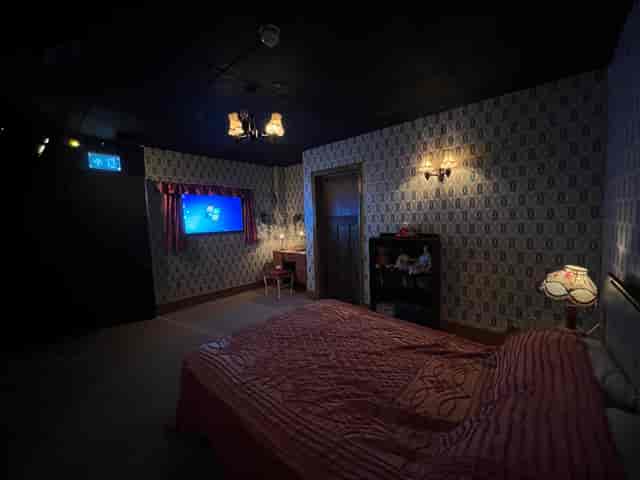 Spooky Escape Room with vintage decor for immersive events and themed experiences.