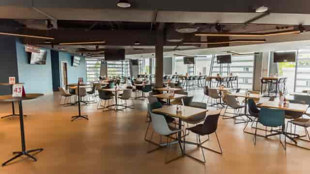 Legends Suite at Brentford FC: modern event space with flexible seating for meetings.