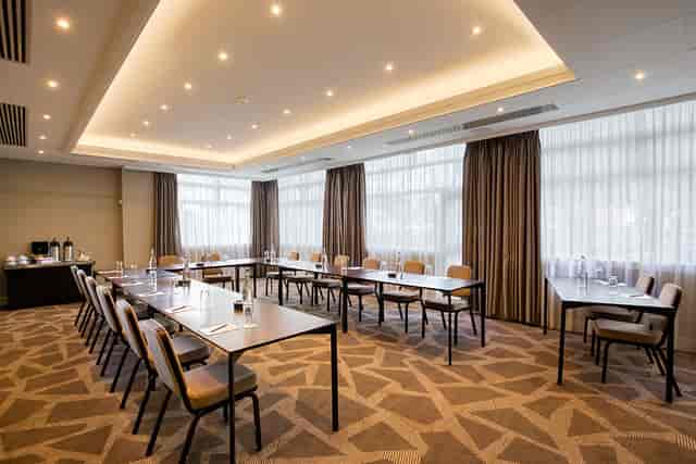 Springfield Suite meeting room with U-shaped tables, ideal for corporate events and workshops.