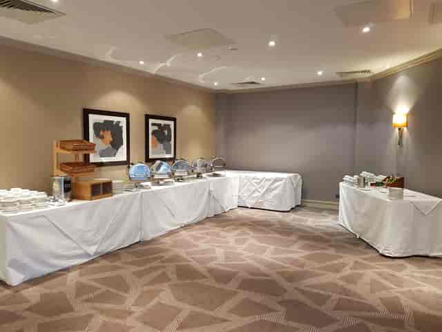 Byron Suite catering setup at DoubleTree London Ealing, elegant tables for meetings and events.