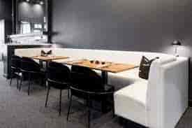 Modern Kimono Room with curved banquette, ideal for networking events and private dinners.