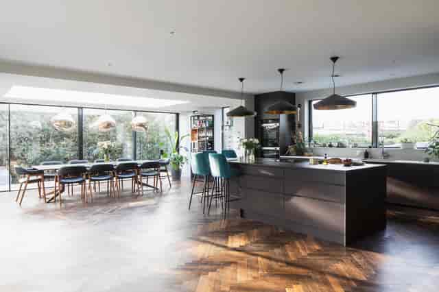 Modern kitchen and dining area in On Kew, ideal for corporate meetings and gatherings.