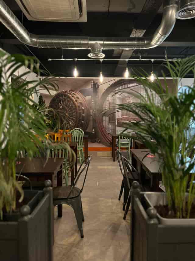 Vintage vault backdrop at The Clarence Cafe Bar, perfect for meetings and gatherings.
