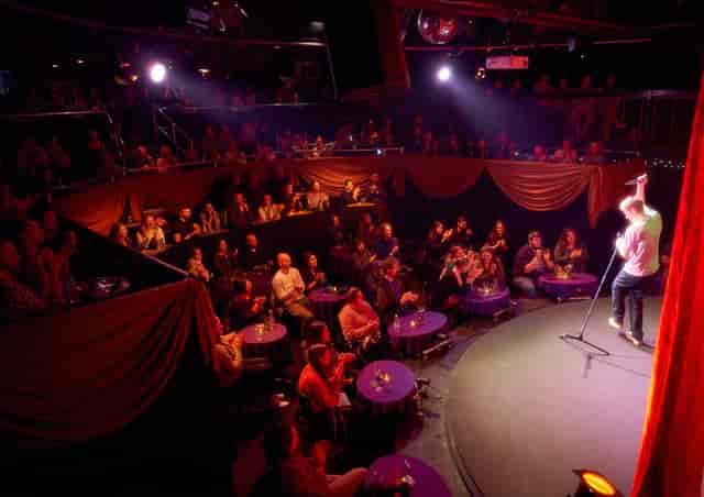 Vibrant Pleasance Theatre performance space with engaged audience for unique events.