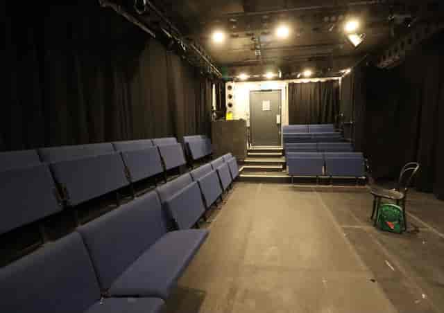 Intimate Pleasance Theatre & Bar with tiered seating for versatile events and performances.