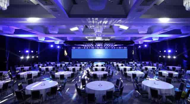 Symphony Ballroom at Hilton Miami Downtown, elegant conference space with blue lighting.