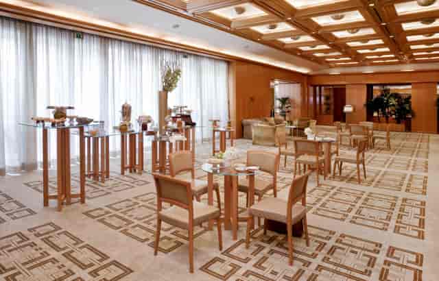 Elegant ballroom at Four Seasons Hotel Milano, perfect for networking events and receptions.
