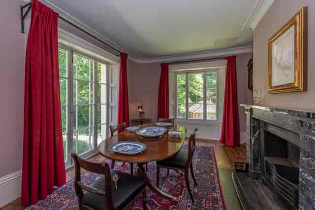 Elegant meeting space in Turner's House with round table, ideal for private dinners and gatherings.