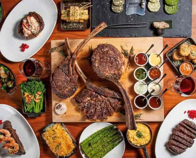 Tomahawk steak feast at STK Rooftop, ideal for corporate events and fine dining.