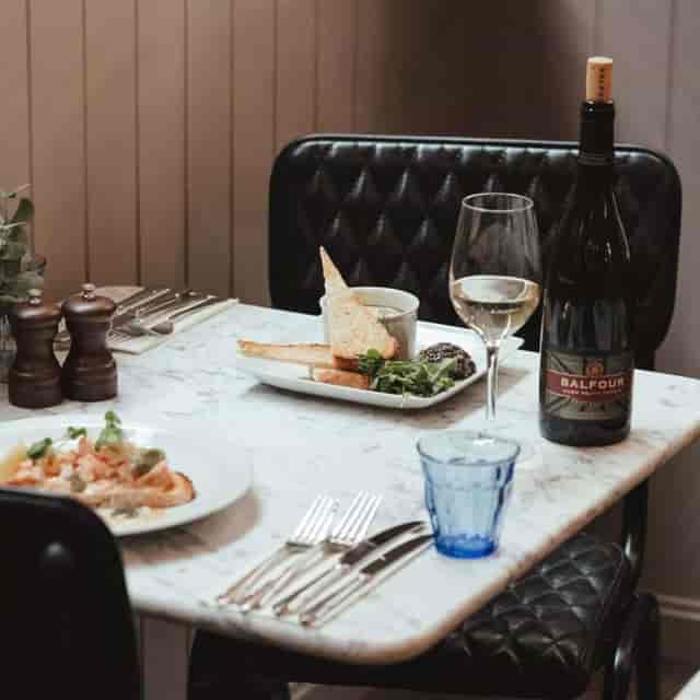 Private dining room with elegant table setting for corporate lunch or networking event.
