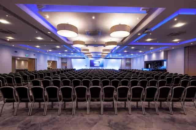 Spacious conference room at The Mercian, ideal for presentations and seminars.