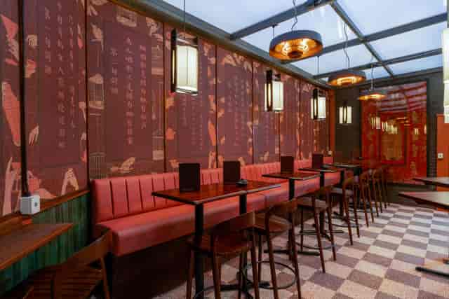 Stylish event space at The Courtyard in Lucy Wong with cozy seating and vibrant decor.