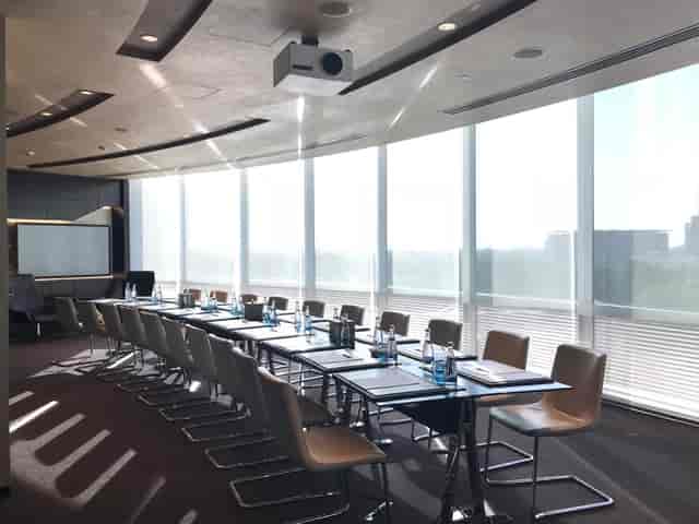 Modern meeting room in Godolphin Ballroom 1, Jumeirah Emirates Towers, ideal for presentations.