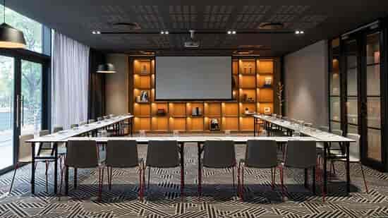 Modern meeting room in Radisson RED, Rosebank with ergonomic chairs for professional events.