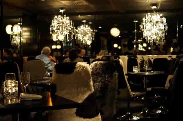 Elegant dining venue in Leeds with chandeliers, perfect for upscale events and gatherings.
