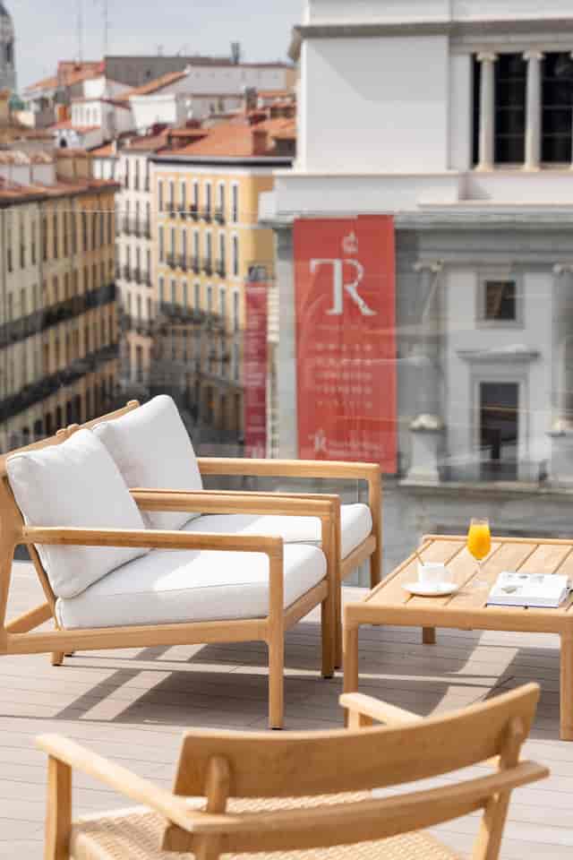 Stylish outdoor seating at Ocean Drive Madrid Hotel, perfect for networking events.