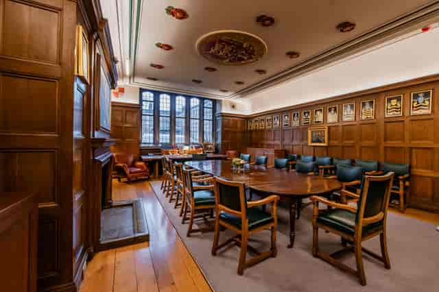 Gray's Inn wood-paneled meeting room, executive retreat, board meeting.