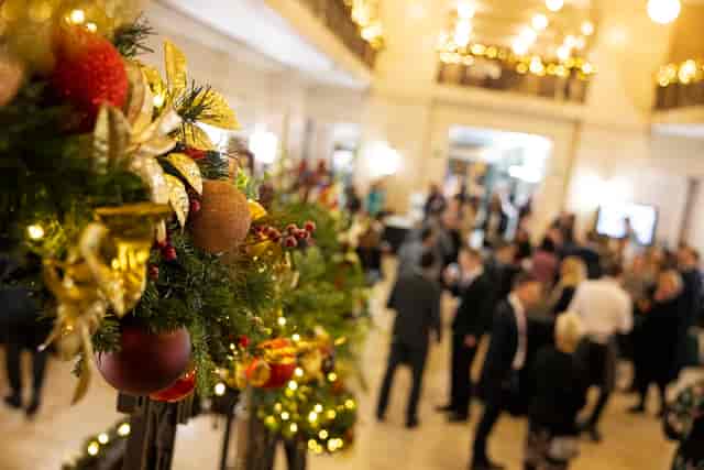"Senate House Christmas party at University of London, festive decor and networking atmosphere."