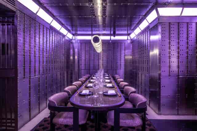 Sleek dining space with metallic walls for exclusive events at Lucky Cat, Manchester.
