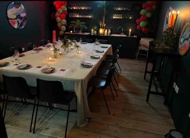 Elegant dining table setup in cozy Studio 57, perfect for private events and gatherings.