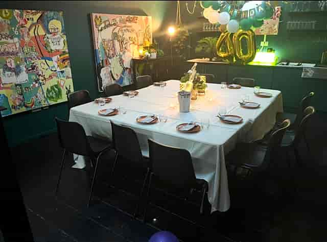 Elegant dining table setup at Studio 57 for intimate events in Kix Bar + Kitchen.