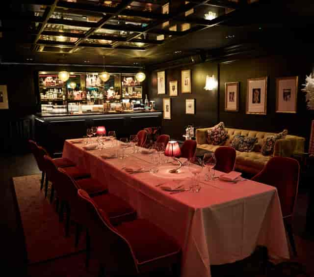 Elegant dining space in Kinnaird Lounge, perfect for intimate gatherings and corporate dinners.