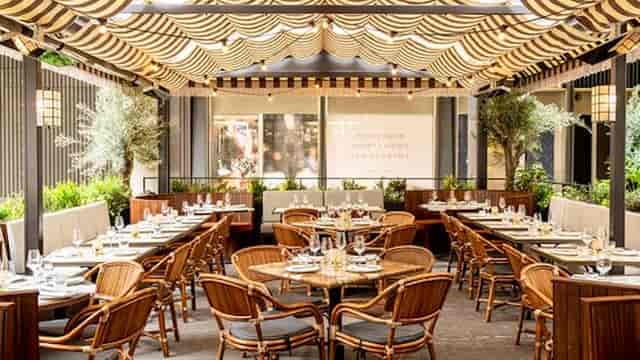 Stylish outdoor dining space at The Maine Mayfair, perfect for events and gatherings.