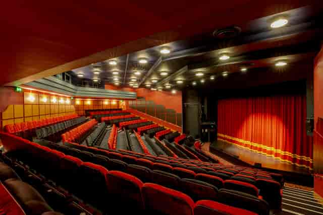 The Shaw Theatre with tiered seating, ideal for conferences and performances.