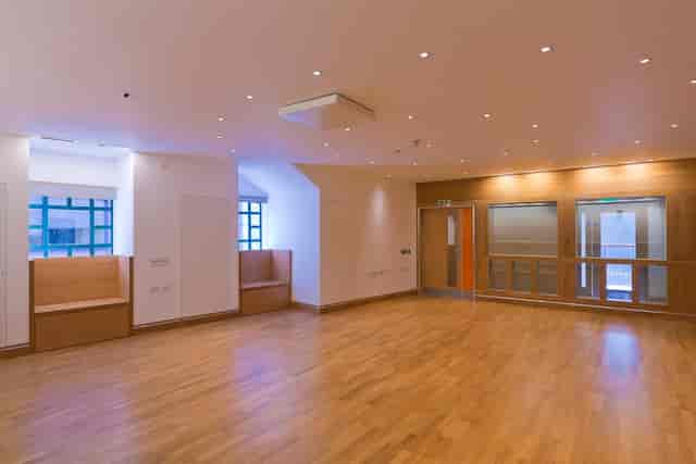 Education Studios at Shakespeare's Globe, versatile event space with warm wood flooring.